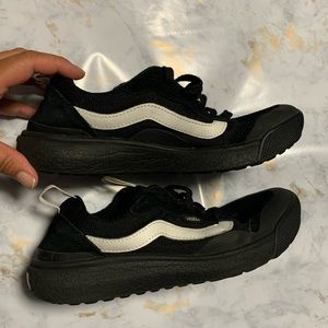 Vans black and white ultra range. Men 7 women 8.5 good cond. lots of life left